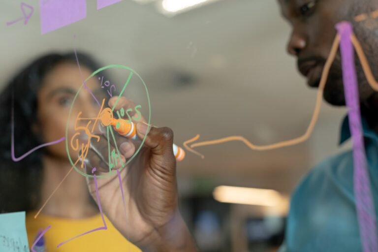 african-american-businessman-drawing-graph-on-glas-2025-04-03-07-00-47-utc